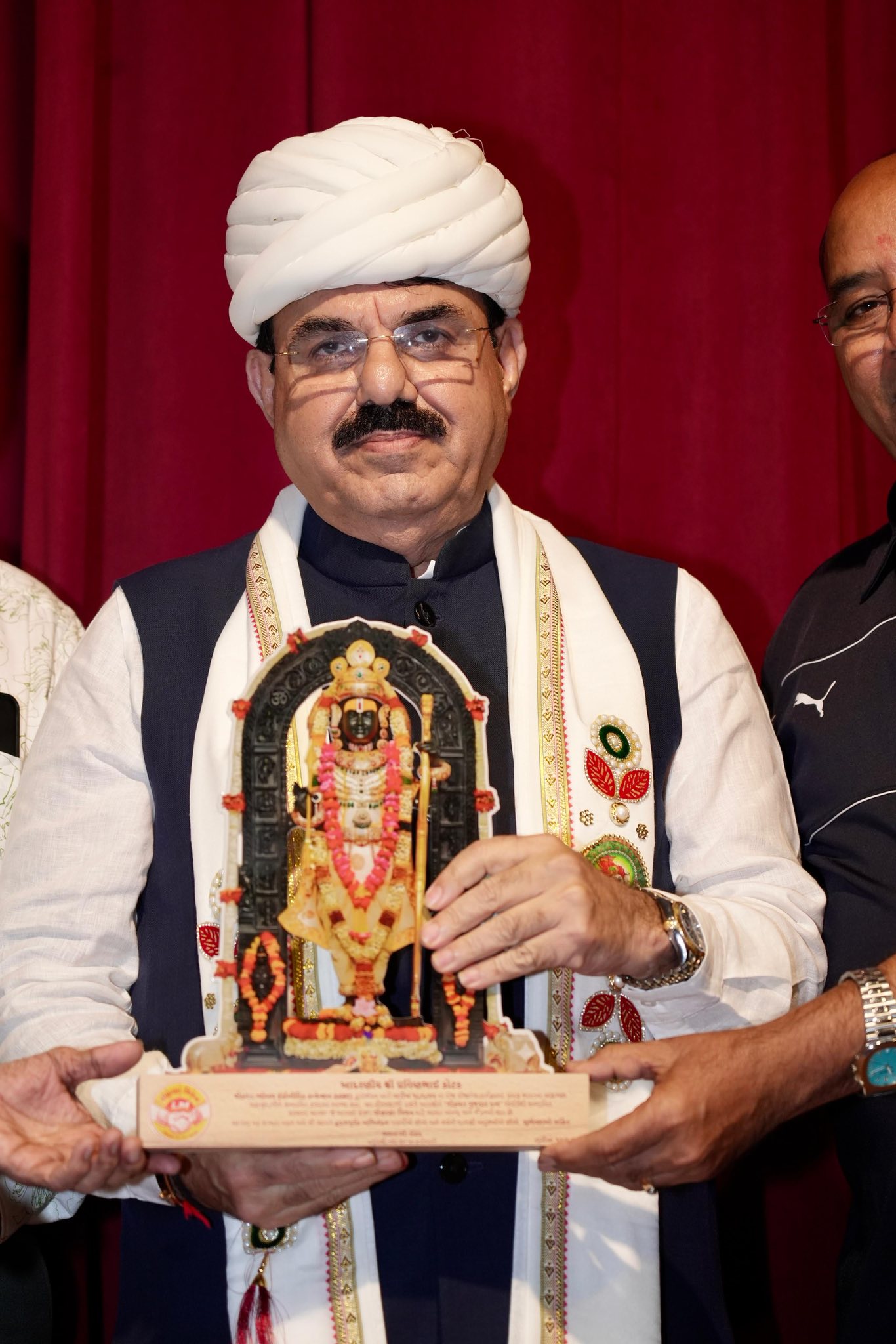 Pravin Kotak receiving award for excellence